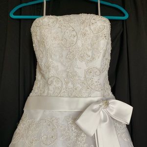 White wedding dress with intricate beading.